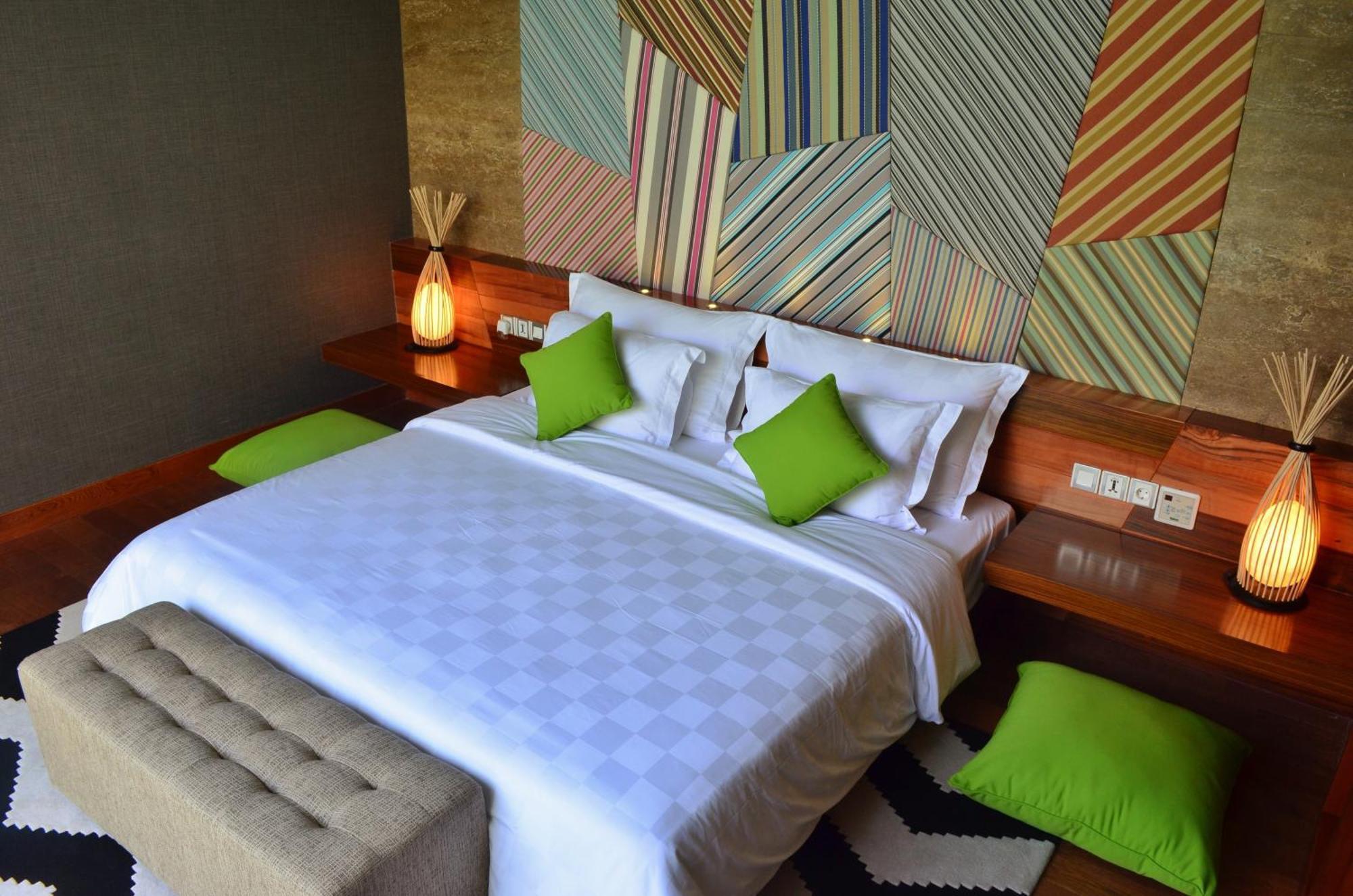 Ts Suites Seminyak Habitación foto A bedroom at the hotel