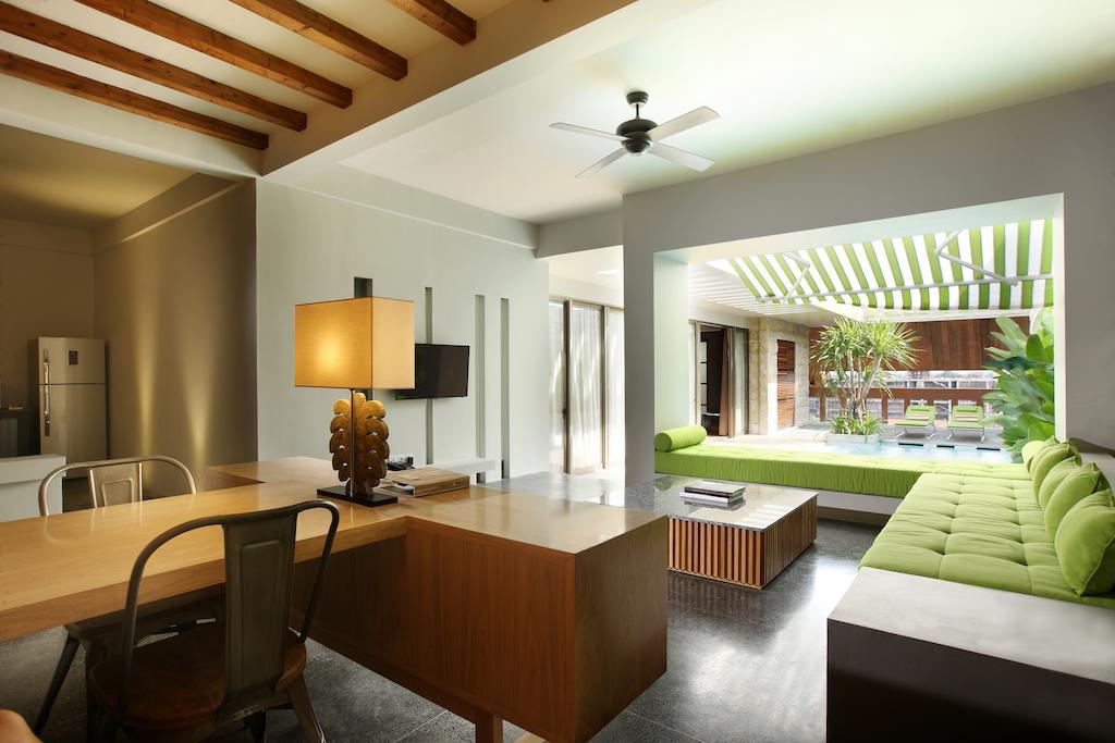 Ts Suites Seminyak Habitación foto Interior of a villa at the resort